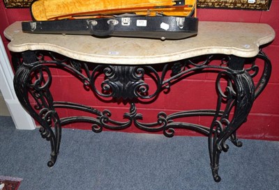 Lot 672 - A marble topped wrought iron console table