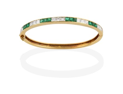 Lot 2308 - An 18 Carat Gold Emerald and Diamond Hinged...