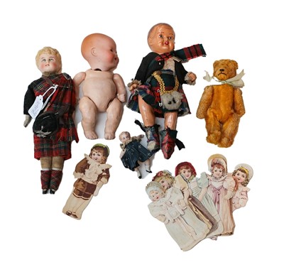 Lot 1040 - A bisque head doll in a Scottish outfit of...