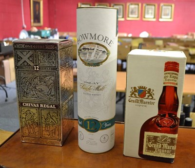 Lot 704 - Bowmore 12 Year Old, 70cl, 40%, in original tube; Grand Marnier; Chivas Regal 12 Year Old...