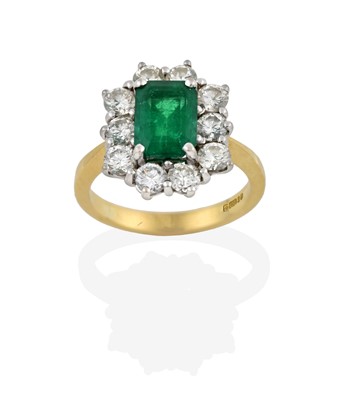 Lot 2304 - An 18 Carat Gold Emerald and Diamond Cluster...