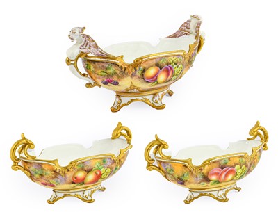 Lot 73 - A Garniture of Three Royal Worcester Porcelain...
