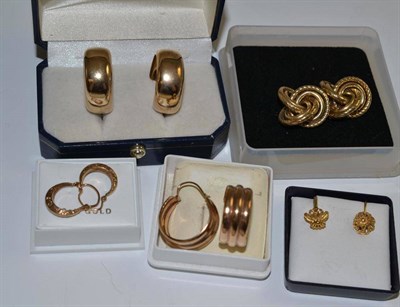Lot 5 - Four pairs of earrings and a yellow metal pair