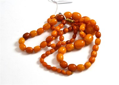 Lot 6 - Two strands of amber beads