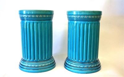 Lot 879 - A Pair of Burmantofts Faience Pottery Garden Seats, cylindrical fluted column form with aperture in