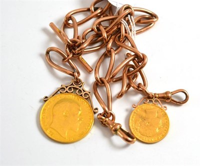 Lot 9 - A 9ct gold chain with two pound coin and sovereign