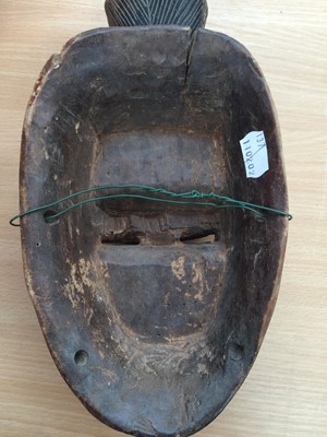 Lot 276 - Three Baule Carved Wood Masks, West Africa,...