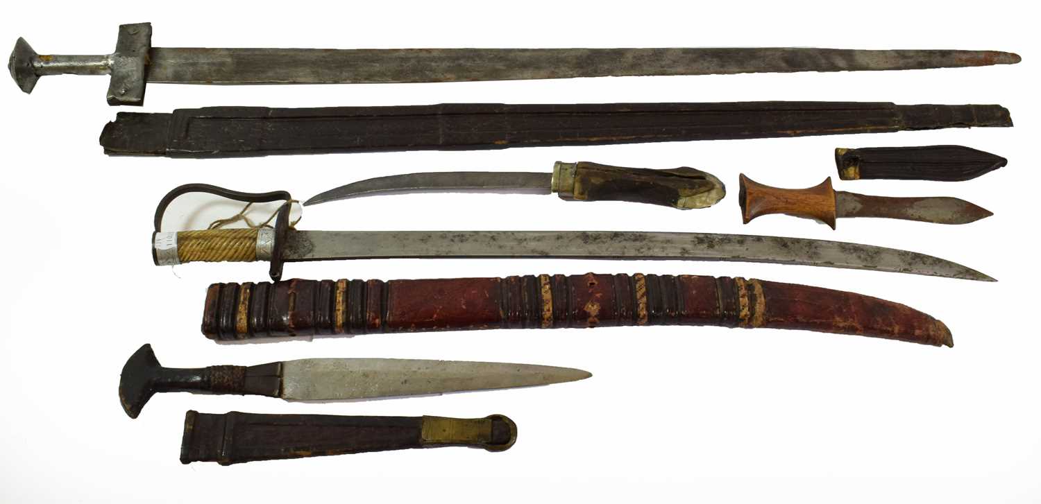 Lot 241 - A Tuareg Takouba, with hand forged double edge...