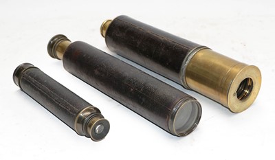 Lot 18 - A brass three draw telescope, the leather...