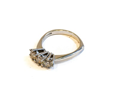 Lot 168 - An 18 carat white gold diamond three stone...
