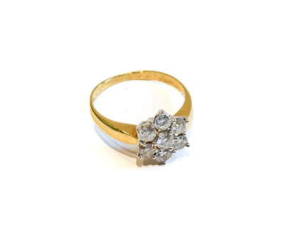Lot 166 - A diamond cluster ring, the round brilliant...