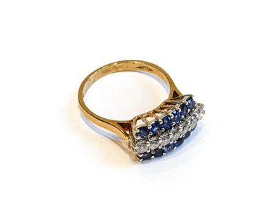 Lot 157 - A 9 carat gold sapphire and diamond ring, a...