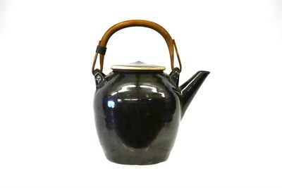 Lot 881 - Dame Lucie Rie (1902-1995): A Stoneware Teapot and Cover, with applied bamboo handle, covered...