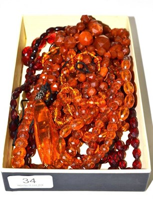 Lot 34 - A quantity of amber and amber type beads