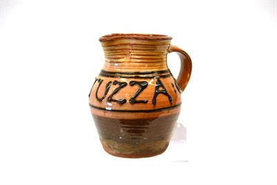 Lot 882 - Michael Ambrose Cardew (1901-1983): An Earthenware Jug, ridged body with inscription SIATUZZA,...