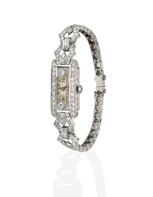 Lot 2352 - A Lady’s Platinum Diamond Cocktail Wristwatch,...