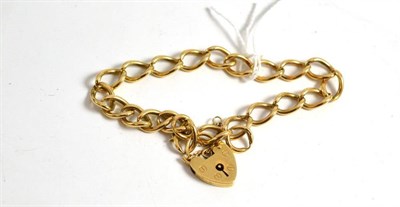 Lot 55 - A 9ct gold curb and lock bracelet