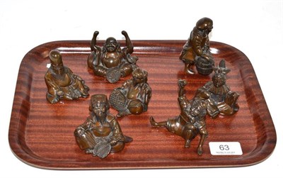 Lot 63 - A set of seven bronze figures of various sage, scholars etc