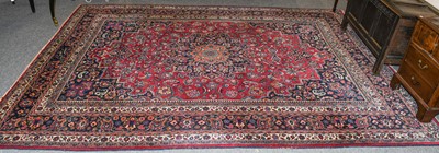 Lot 1123 - A signed Masshad carpet, the raspberry field...