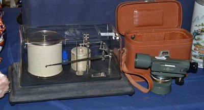 Lot 71 - A barograph with plaque signed Casella, London and a theodolite cased instrument (2)