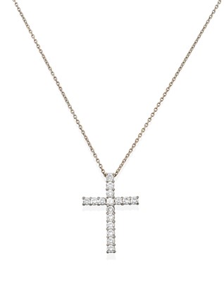 Lot 2369 - An 18 Carat White Gold Diamond Cross Pendant...