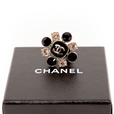 Lot 3022 - A Black and Pink Stone Ring, by Chanel, the...