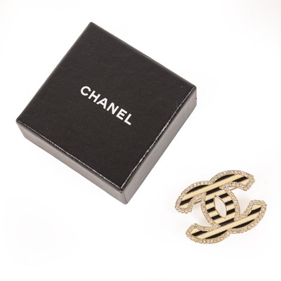 Lot 3009 - An Enamel and Paste Brooch, by Chanel, two...