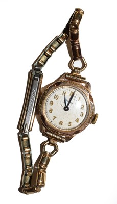 Lot 60 - A lady's 9 carat gold wristwatch, signed Rolex,...