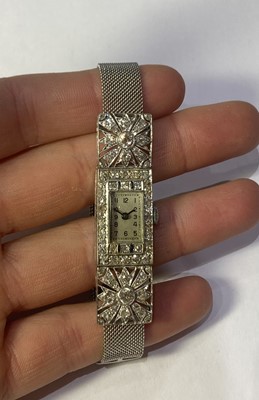 Lot 2261 - A Lady's Diamond and Sapphire Cocktail Wristwatch