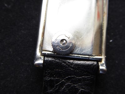 Lot 2239 - A Rectangular Back Winding Wristwatch, signed...