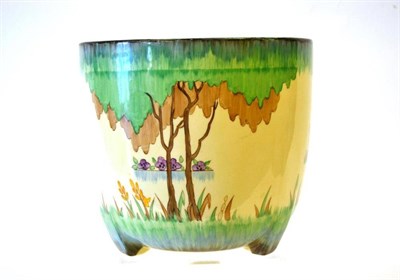 Lot 887 - A Clarice Cliff Bizarre Dover Jardiniere, painted with green and brown trees with grass and...