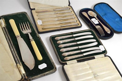 Lot 92 - A silver presentation fork and spoons (cased), a cased silver and ivory fish serving set, a set...