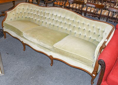 Lot 507 - A 20th century carved walnut three-seater sofa,...