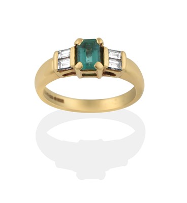 Lot 2326 - An 18 Carat Gold Emerald and Diamond Ring