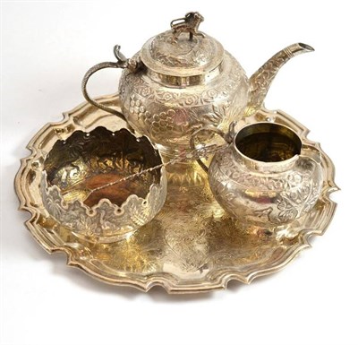 Lot 97 - Indian white metal composite tea set and spoon