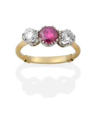 Lot 2373 - A Synthetic Ruby and Diamond Three Stone Ring