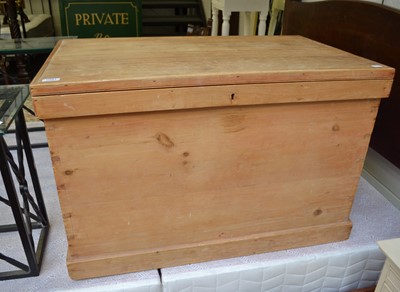 Lot 1091 - A Victorian pine trunk with a hinged lid,...