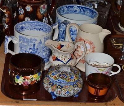 Lot 104 - Two blue and white loving cups, a Meacham teapot, a creamware jug, a moustache cup, two pieces...