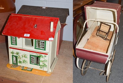 Lot 321 - A Triang doll's pram, two 1950s dolls houses...