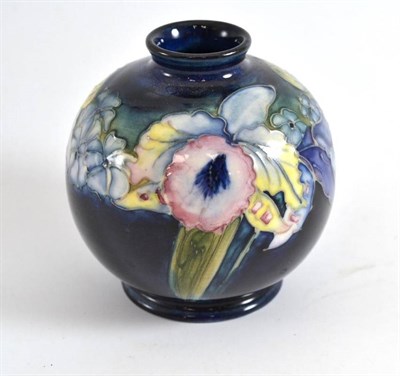 Lot 141 - A William/Walter Moorcroft Orchid and Spring Flowers pattern vase, of globular design,...
