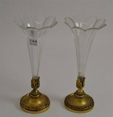 Lot 144 - A pair of cut glass vases with gilt metal mounts