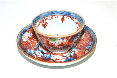 Lot 147 - Clobbered Chinese tea bowl and saucer