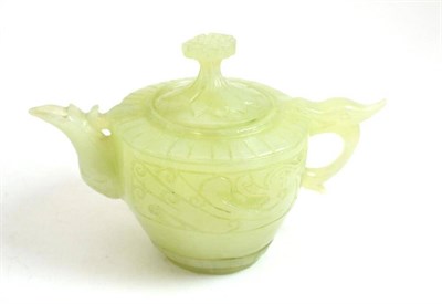 Lot 148 - Chinese carved jade teapot