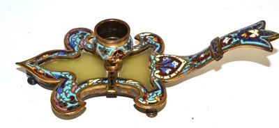 Lot 149 - A French champleve enamel chamberstick