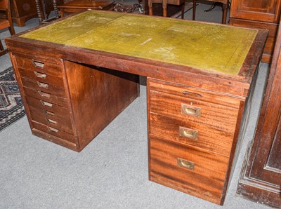 Lot 473 - An early 20th century leather inset oak...