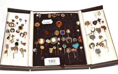 Lot 180 - A box containing a large quantity of stick pins