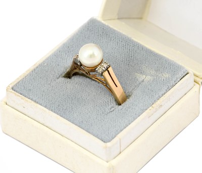 Lot 181 - A cultured pearl and diamond ring, the...