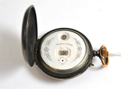 Lot 195 - A gun metal pocket watch with digital dial display