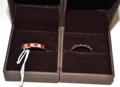 Lot 218 - A ruby and diamond half hoop ring and a sapphire five stone ring stamped '585' (2)