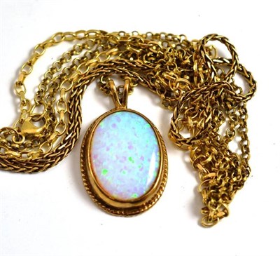 Lot 225 - Two fancy link necklace and an opal pendant on a chain